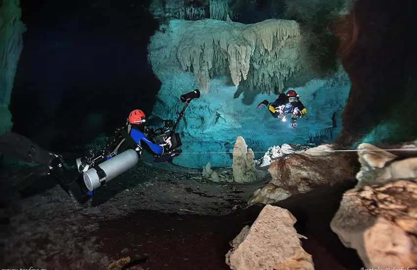 Cave diver with light